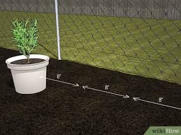 Chain link fence posts should be 'stuck' down to their respective grade marks and plumbed with guide string. 3 Ways To Add Privacy To A Chain Link Fence Wikihow