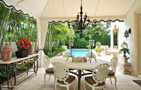 Set of four newly upholstered vintage palm beach … set of four newly upholstered vintage palm beach chic hollywood regency cathedral rattan dining chairs in green and white print. Palm Beach Chic The Glam Pad