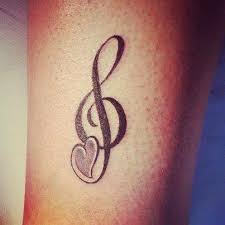 Such a design is really eye catching and is versatile enough to be used in any way and placed well on any location. 32 Cool Music Note Tattoo Ideas Music Notes Tattoo Music Tattoo Designs Music Note Tattoo