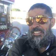 Who is the oldest person to complete the Great Divide Mountain Bike Route?