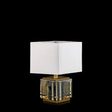 The cylindrical base is made of clean, optical crystal fitted with nickel hardware at the top. Buy Regina Cognac Crystal Block Table Lamp Online In India