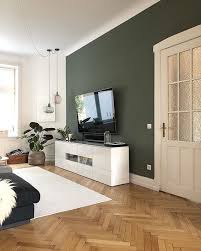 Wie befestige ich den teppich an der wand aus gipskartonplatten? Grune Wand Im Wohnzimmer Stimmig Mit Braunem Fussboden Und Hellem Teppich Grune Wand Im Wo Wandgestaltung Wohnzimmer Farbe Farbgestaltung Wohnzimmer Grune Wand