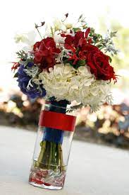 Top 17 Centerpiece Designs For July 4th Easy Patriotic Holiday Party Decor Project July Wedding Flowers July Flowers Patriotic Wedding