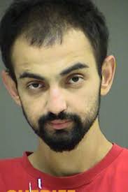 Man arrested in connection with auto repair shop burglary