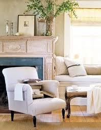 Chic Living Room With A Window Seat Combined With Chair Ottoman Makes A Great Conversation Reading Area Living Room Seating Chic Living Room Home