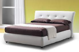 Letto in ecopelle con testiera imbottita ed imputurata a rombi. Letto Matrimoniale Con Base Armadio Materassi Com