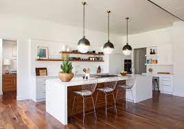 The white quartz countertop is a modern feature that feels retro thanks to its speckled pattern. 75 Beautiful Mid Century Modern Kitchen With An Island Pictures Ideas July 2021 Houzz