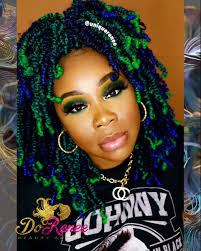 Black And Blue Knotless Braids Blue And Green Spring Twist In 2020 Spring Twists Spring Twist Hair Braids With Shaved Sides