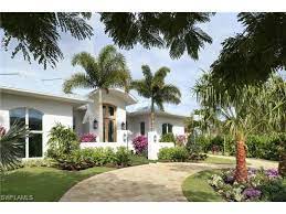 627 5th Ave N Naples Fl 34102 Newly Completed Custom Home Sited In Old Naples Most Tranquil Residential Ar Palm Beach Garden Landscape Design Estate Homes