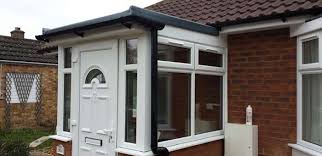 Flat roof over front door. Modern Front Porch Flat Roof Designs