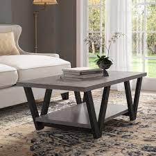 This unique coffee table is the perfect place to store your magazines, place your drinks and make yourself comfortable in the living room. Trent Austin Design Bottomley Coffee Table Reviews Wayfair