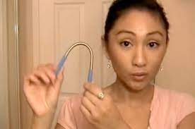 The r.e.m spring facial hair remover, a tight metal coil about five inches long, with tapered metal grips at each end. It S A Spring It S A Stick It S A Facial Hair Remover Beautylish