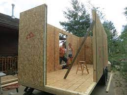 Debt Free Tiny House Built Using Sips And How They Built It Tiny Mobile House Building A House Tiny House Company