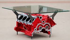 It has been thoroughly cleaned and degreased then painted, polished, and finally clear coated to give you the beautiful piece seen in the pictures. Ferrari Engine Coffee Table