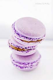 Place the almond flour and confectioner's sugar into a fine mesh sifter and sift the flour and sugar into a large bowl. Macarons The Purple Kind Macarons Macaroons Desserts
