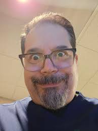 Hi all! I just wanted to introduce myself and share a photo I took. This my  kitten, Ebony Snow!! She's still a baby. She was born