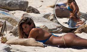 The Bachelor's Noni Janur flaunts pert derriere in G-string bikini at Bondi  Beach | Daily Mail Online