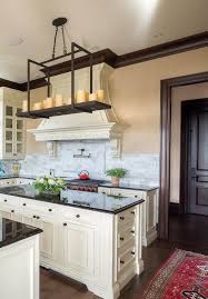 Dark cabinets with white countertops ambrosia white granite countertops. Black Granite Kitchen Countertop With Cream Colored Cabinets Black Hardware Dark Wood Trim Black Granite Kitchen Granite Kitchen Brown Cabinets