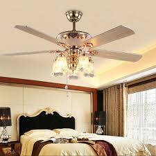This type of ceiling light is sleeker than a chandelier, so it is perfect for use with cozier rooms. Andersonlight Art Deco Ceiling Fan Remote Control With 5 Wood Blades 5 Glass Flower Shades Reversible Quiet Motor Buy Online In Cayman Islands At Cayman Desertcart Com Productid 177288688