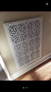 Upcycle an old cabinet drawer front into a rustic decorative vent cover! Medallion Revent Cover Decorative Vent Covers Decorative Vent Cover Wall Vents Wall Vent Covers