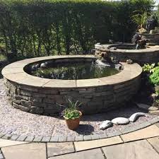 Concrete blocks can be rendered on the outside or a rustic brick can make a newly built raised pond look instantly aged. Pond Design Water Feature Installation Perfect Ponds
