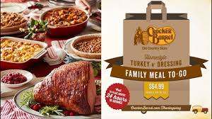 Traditional christmas dinner features turkey with stuffing, mashed potatoes, gravy, cranberry sauce, and vegetables such as carrots, turnip, parsnips, etc. Cracker Barrel Holiday Family Meal To Go Review Catered Holiday Meals Youtube