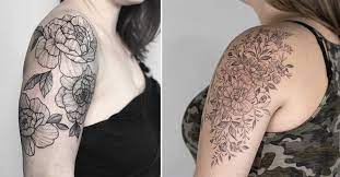 An ethereal black and gray flower themed piece tattoo hugging the lower arm. 22 Awesome Floral Sleeve Tattoo Design Ideas