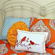 The inspiration was the tiny collage to the right of the bed. Orange And Turquoise Bedroom Decor Makes Me Smile