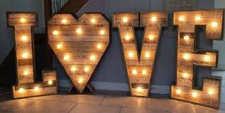 Rustic Light Up Love Letters Bouncy Castle Hire And Mascots Hire In Rotherham Sheffield Doncaster Worksop
