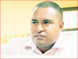 Who was the senior public servant from Bulolo district who campaigned for  Basil at Sambio village