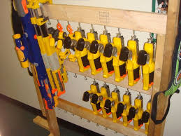 Check out this video and all. Diy Nerf Gun Rack Nerf Gun Storage Rack Nerf Pinterest We Made This Nerf Gun Cabinet With 2 Ikea Besta Shelf Frames Anak Pandai