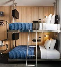 View Our Pod Style Rooms At The Pod Hotel Cheap Hotel In Nyc Hotel Room Design Family Room Design Custom Bunk Beds