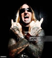 Abraham Cunningham of Deftones poses for a photoshoot