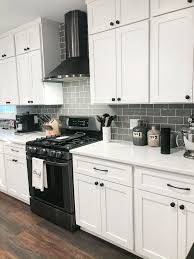 Home Renovation In 2020 Black Kitchen Countertops White Cabinets Black Countertops Black Appliances Kitchen