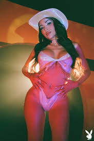 Sexy Latina cowgirl Maddy Belle teasing with her big breasts