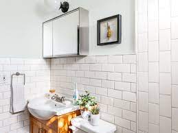 Try different shapes of tiles on the floor and in the shower, with crisp paint on the walls and all white accents. Paint Color Ideas For A Small Bathroom