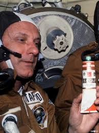 NASA postpones spacewalk over 'debris' alert