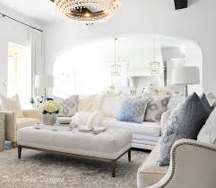Today's post is about 3 ways to style a coffee table or ottoman. Coffee Table Styling Decor Gold Designs