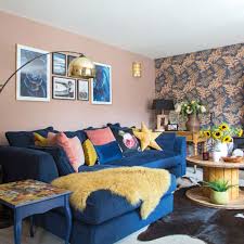 The settee in this room was given a modern update with wild fabric, while neutrals were used for the curved vintage sofa and rounded swivel chairs. Living Room Colour Schemes Decor Ideas In Every Shade To Add Character