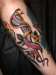 { 31 } rose surrounded by snakes with knife tattoo. Snake And Dagger From Antonio Roque At Key City Tattoo Frederick Md Tattoos