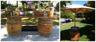 * please call us for any questions on our 6ft whiskey barrel tabletop top only rentals, serving tampa bay, brandon fl, riverview fl, seffner fl, & lakeland florida. Wine Barrel Bar Barrel Cocktail Tables With Umbrellas Mobile Bar Rental Service Tampa Fl Wine Barrel Bar Barrel Bar Wine Barrel