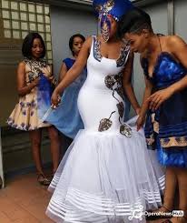 They are like uniform dresses worn by family. Check Out These Beautiful Ankara Inspired Wedding Gowns Operanewsapp African Traditional Wedding Dress African Wedding Attire African Traditional Dresses
