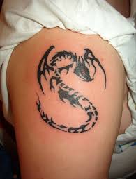 The tribal dragon tattoos has gradually evolve into different shapes, sizes, patterns and colors and is one of the most popular tattoo designs across different cultures today! 26 Wonderful Tribal Dragon Tattoos