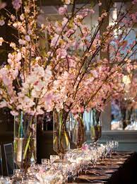 Salute The Spring With A Cherry Blossom Wedding Cherry Blossom Centerpiece Cherry Blossom Theme Cherry Blossom Wedding