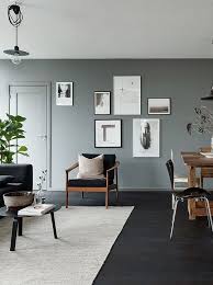 Curious about how to pull off the look? Black Floors Grey Walls And Lots Of Art Pieces Coco Lapine Design Dark Grey Living Room Living Room Grey Living Room Carpet