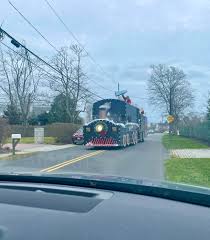 Saw the Polar Express today in WH today, Santa(and the Grinch) have come to  town. Great surprise to see the fire department do it up today, by driving  around the neighborhood with