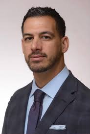 Michael Della, Partner