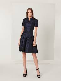 This Elegant Cocktail Dress Is Crafted From Navy And Black Floral Cloque With A Pleated Skirt To Create Elegant Cocktail Dress Party Dresses For Women Dresses