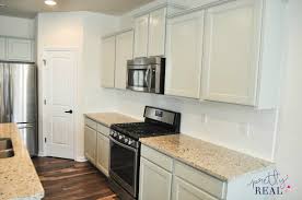 painted our brand new kitchen cabinets