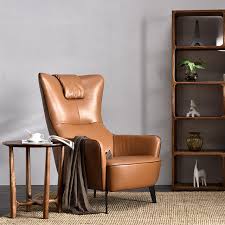 Supported by a solid and manufactured wood frame, this sofa strikes a streamlined silhouette with a pair of back cushions, track arms, and round tapered legs in a pecan finish. Nordic Leather Sofa Chair Living Room Single Chair Simple Modern Tiger Chair Casual Chair Single Chair Back Chair Leather Chair